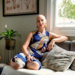 Author & Australian Writers' Centre alumna Naomi Hart sitting on couch